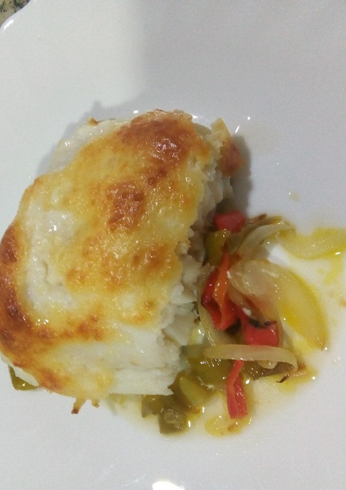 Una foto de Bacalao gratinado