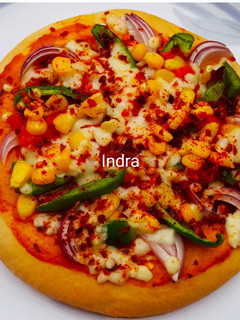 कॉर्न चीज पिज़्ज़ा(corn cheese pizza recipe in hindi) रेसिपी मुख्य फोटो