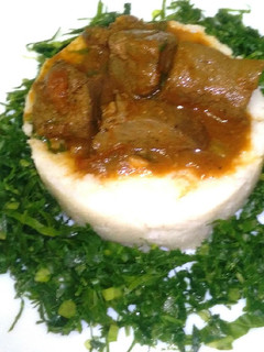 A picture of Fried liver with ugali.