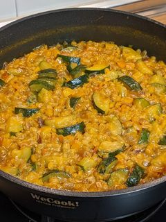 Una foto de Lentejas peladas con calabacín y especias Ras el Hanout