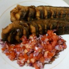A picture of Fried Mudfish with Kachumbari.