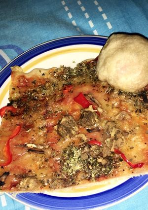Una foto de Pizza