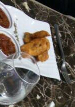 Una foto de Tiras de Pollo Rebosado a la Parmesana
