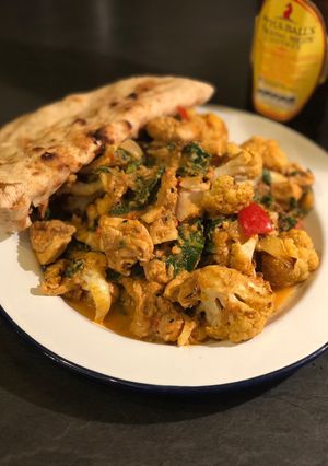 A picture of Roast cauliflower and chicken curry 🍛.