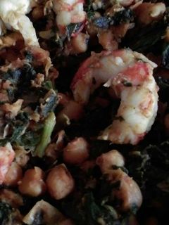 Una foto de Garbanzos tostados al pimentón con espinacas