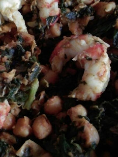 Una foto de Garbanzos tostados al pimentón con espinacas
