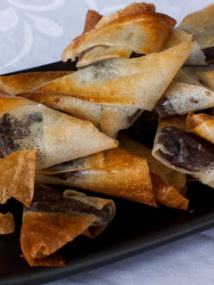 Una foto de Triángulos de morcilla