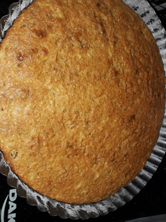 Una foto de Tarta de Pera, pasas uva y coco