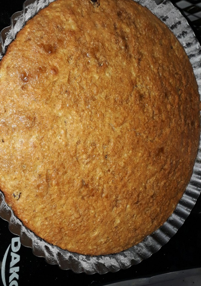 Una foto de Tarta de Pera, pasas uva y coco