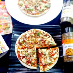 A picture of Quick Veg Dosa Pizza.