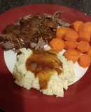 Slow cooked beef brisket, mash carrots and onion gravy
