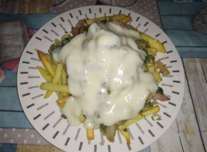 Una foto de Papas champi tuneadas-(incluye salsa blanca dietética)