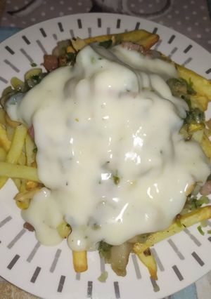 Una foto de Papas champi tuneadas-(incluye salsa blanca dietética)