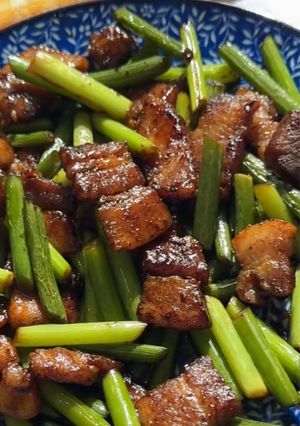 A picture of Stir-Fried Garlic Scapes with Pork Belly.