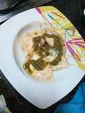 Raviolis de salmón ahumado, rúcula, requesón, nueces y scamorza
