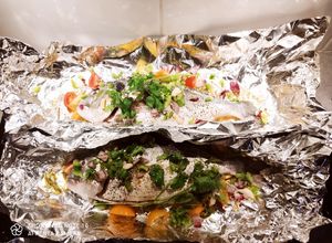 Une photo de Dorades royale en papillotes