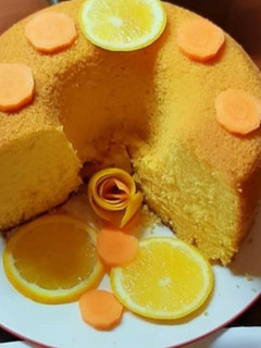 Una foto de Bizcochuelo de zanahoria y naranja