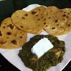 Saag chicken with makai ki roti & Homemade butter A picture of Saag chicken with makai ki roti & Homemade butter.