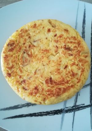 Una foto de Tortilla de patatas con cebolla