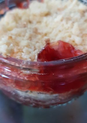 A picture of Individual rhubarb and strawberry crumble.