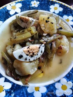 Una foto de Borrajas con aceite de ajo negro