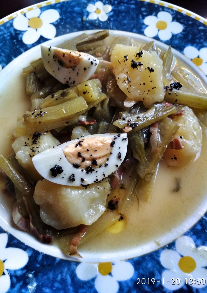 Una foto de Borrajas con aceite de ajo negro