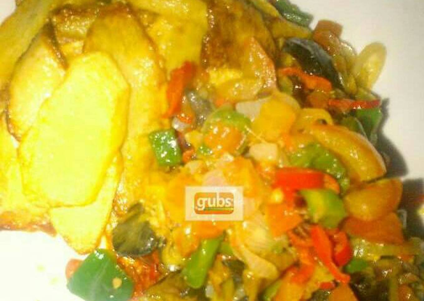 Fried Irish potatoes with snail stir fry