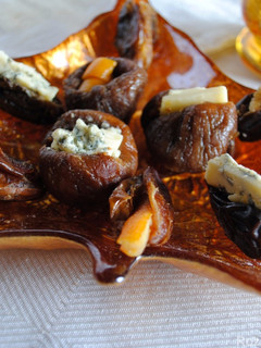 A picture of Stuffed figs and dates with cheese / nuts.