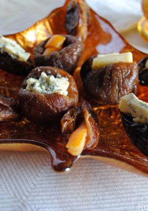 A picture of Stuffed figs and dates with cheese / nuts.