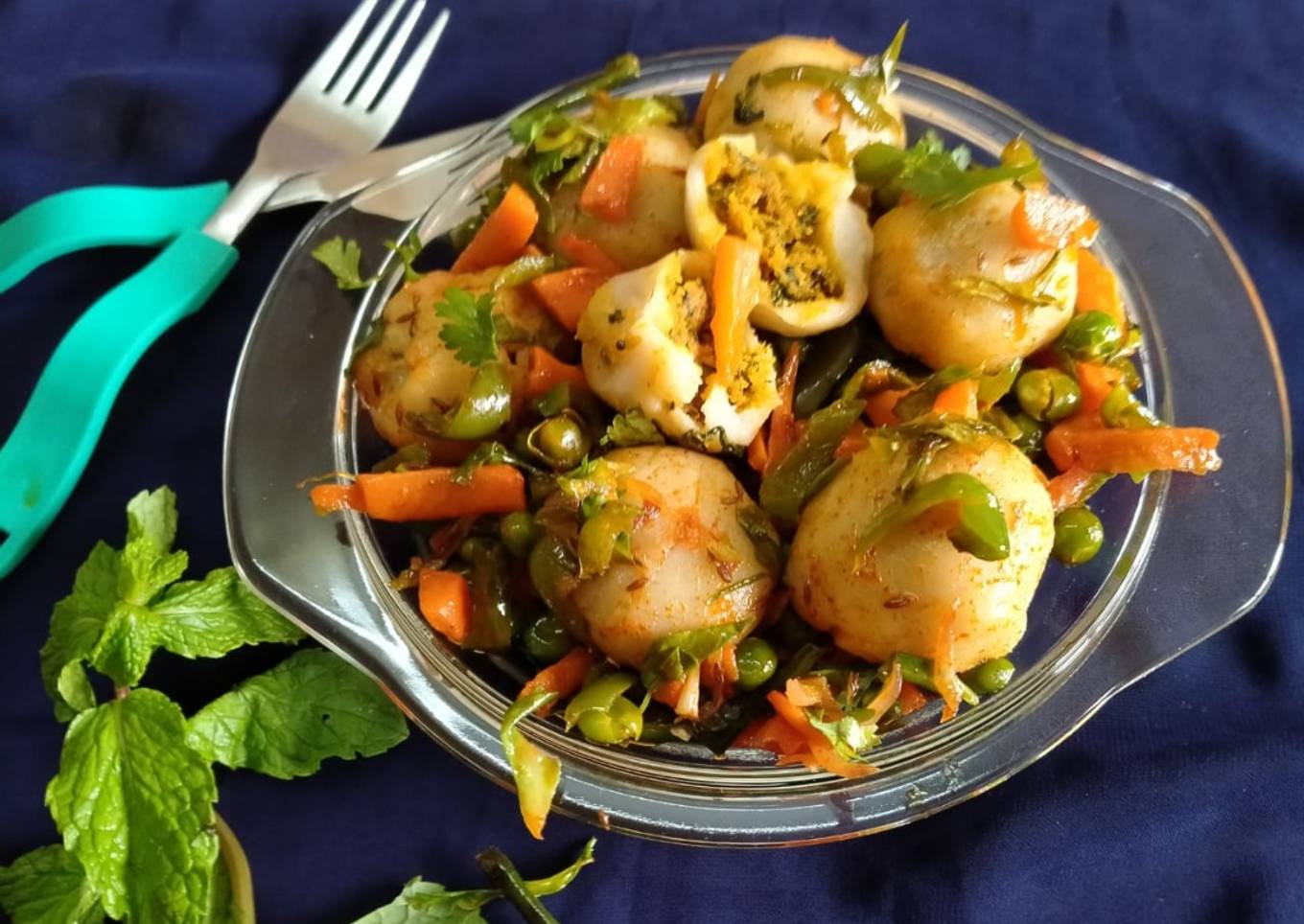 Stuffed Riceballs tossed in mix vegetables