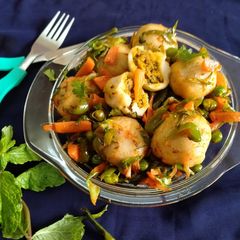 Stuffed Riceballs tossed in mix vegetables A picture of Stuffed Riceballs tossed in mix vegetables.