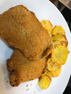 Una foto de Libritos de lomo y queso Ametller con patatas en Airfryer Cosori