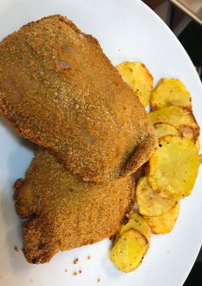 Una foto de Libritos de lomo y queso Ametller con patatas en Airfryer Cosori