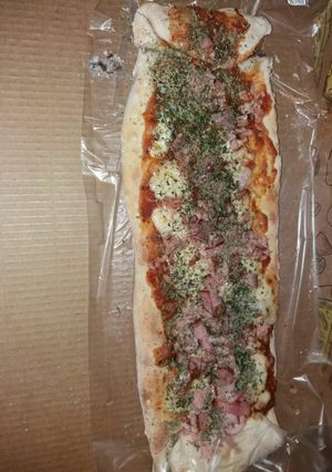 Una foto de Pizza por metro