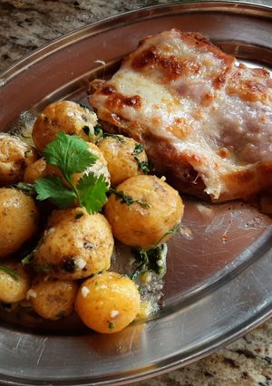 Una foto de Milanesas de pollo a la napolitana