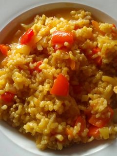 Una foto de Arroz caldoso con pollo