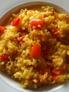 Una foto de Arroz caldoso con pollo