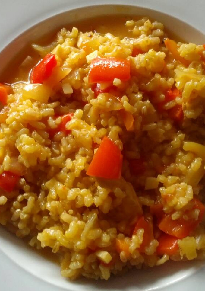 Una foto de Arroz caldoso con pollo