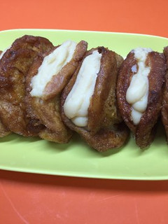 Una foto de Torrijas rellenas de crema pastelera sabor a vainilla
