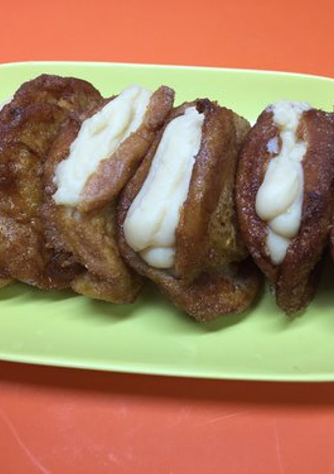 Una foto de Torrijas rellenas de crema pastelera sabor a vainilla