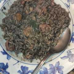 Una foto de Arroz meloso marinero en tinta