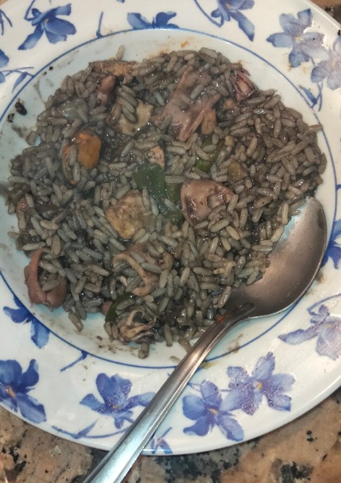 Una foto de Arroz meloso marinero en tinta