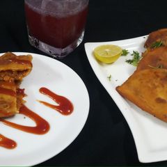 A picture of Veg cheese empanadas.