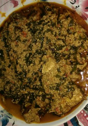 A picture of Egusi soup wit ugu leaves.