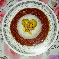 A picture of Daal chawal plater.