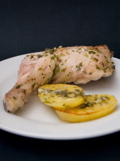 Una foto de Pollo al horno al vino blanco