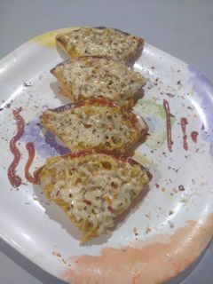 મેગી પીઝા (Maggi Pizza Recipe in Gujarati) રેસીપી મુખ્ય ફોટો