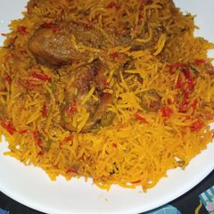 A picture of Smoked Drumsticks Zarda Biryani.