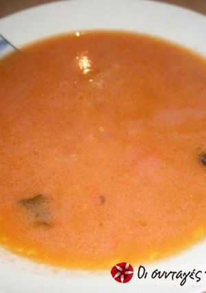 A picture of Redfish soup with tomato.