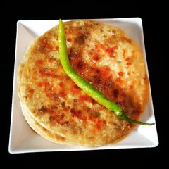 A picture of Besan stuffed paratha.